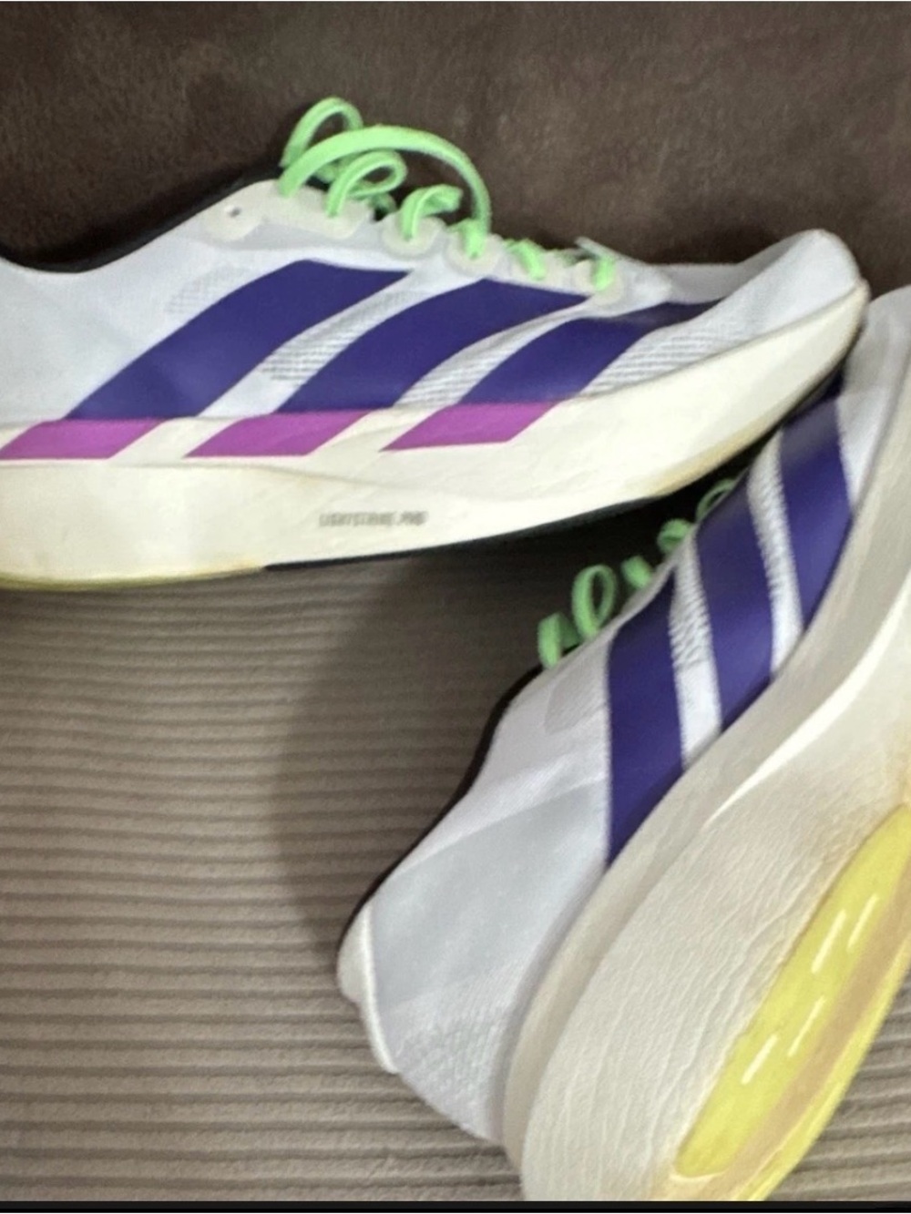 adidas White Running Shoes with Purple Gradient Stripes and Neon Green Laces